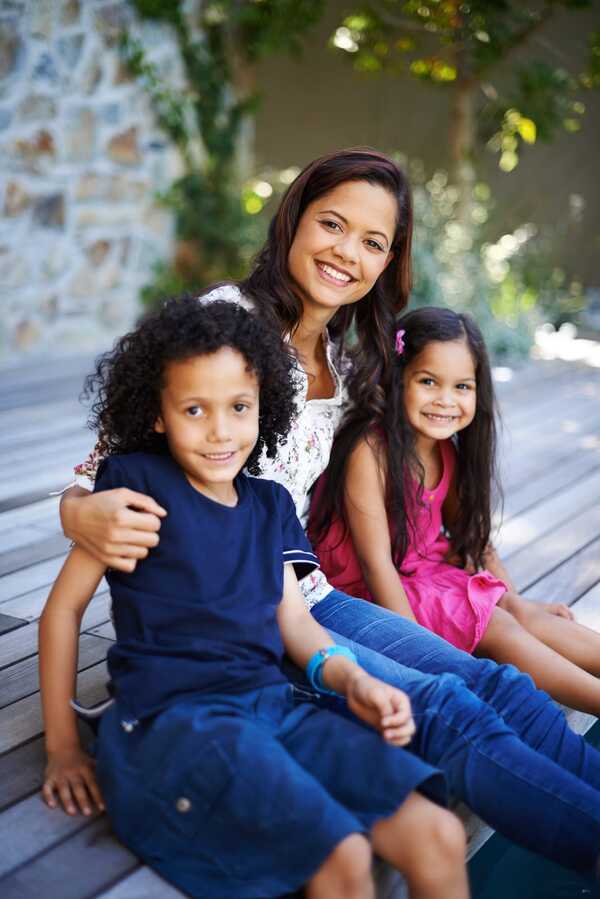 portrait of a mother and two kids register newsletter forkiddos